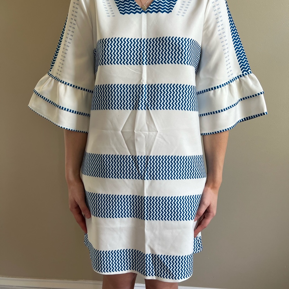 Just needs a little ironing. Never worn but no tag. Cute summer dress.